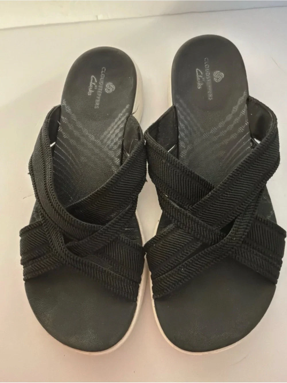 Clarks Black Crisscross Slide Sandals with White Midsole
